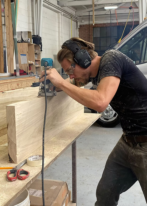 Dustin, founder and professional custom camper van builder at Vanpire Vans in Los Angeles, CA.